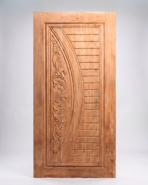 Front view of a hand-carved solid wood door with floral and geometric patterns on a light gray background